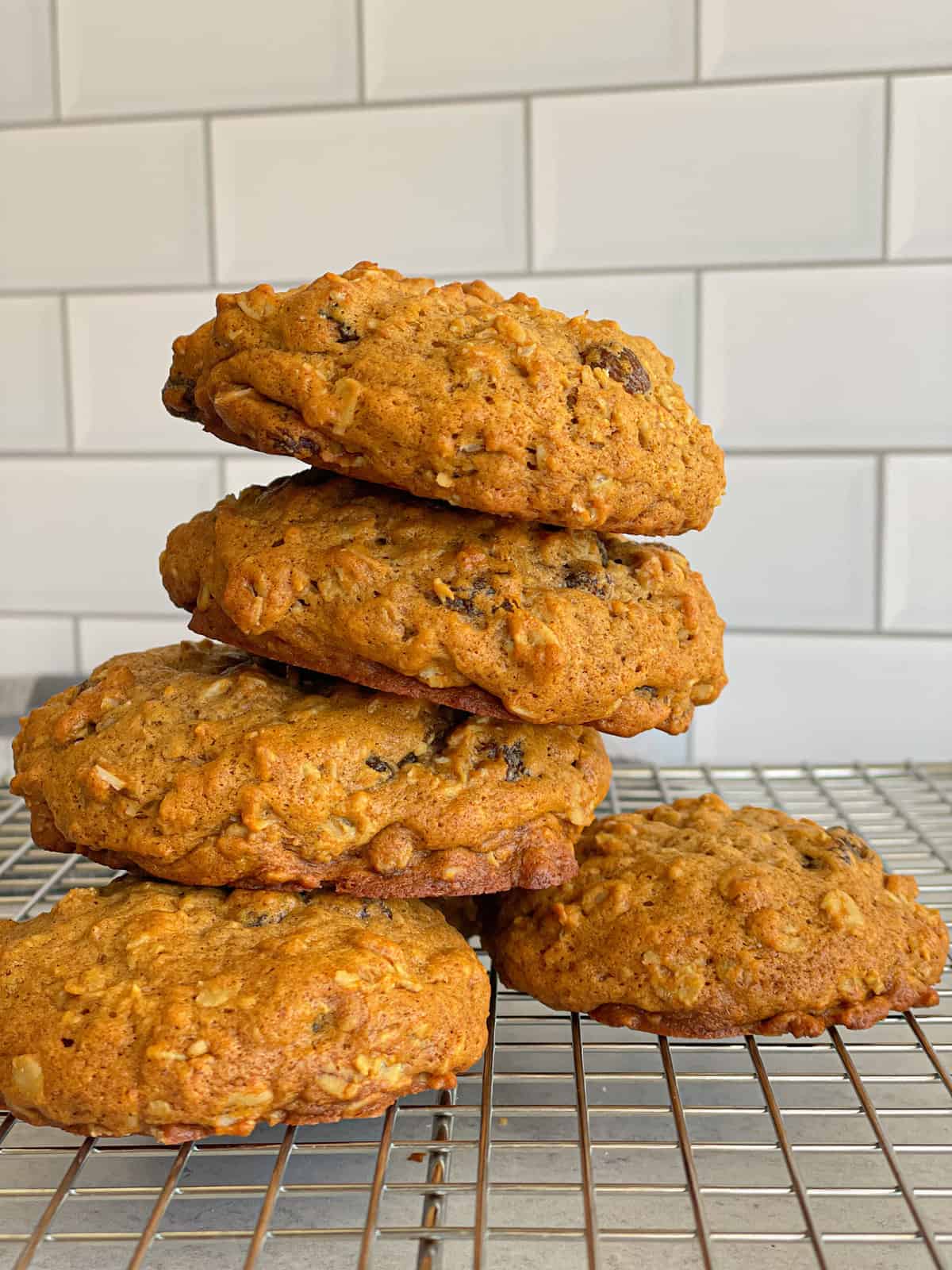 These soft oatmeal raisin cookies with crispy edges are studded with raisins and oats to make a chewy golden treat.