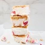 pieces of strawberry shortcake cream bars made with strawberry slices, graham crackers, and heavy cream