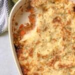 close shot of a pan of vegetarian lentil shepard's pie missing a piece