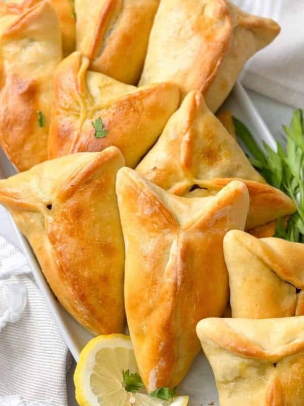 golden crusted lebanese spinach pies ready to be served.