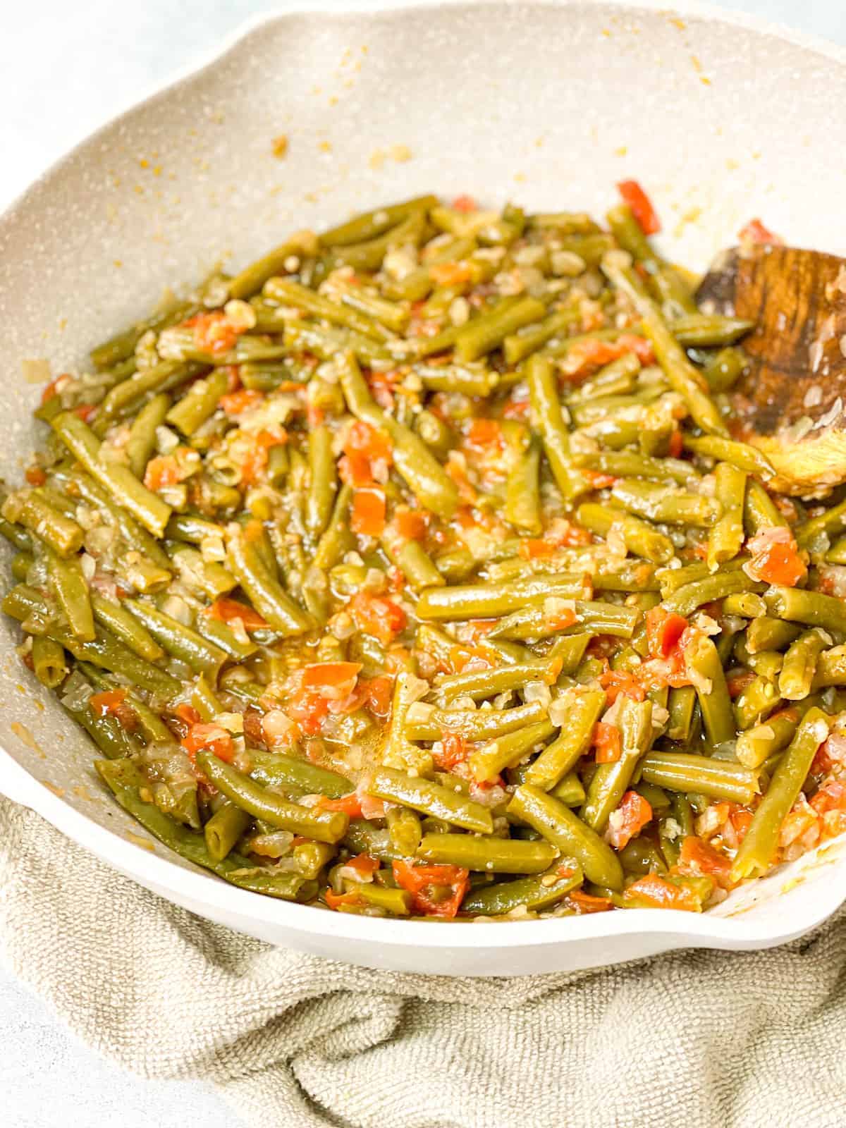 a large plate of delicious braised green beans stew