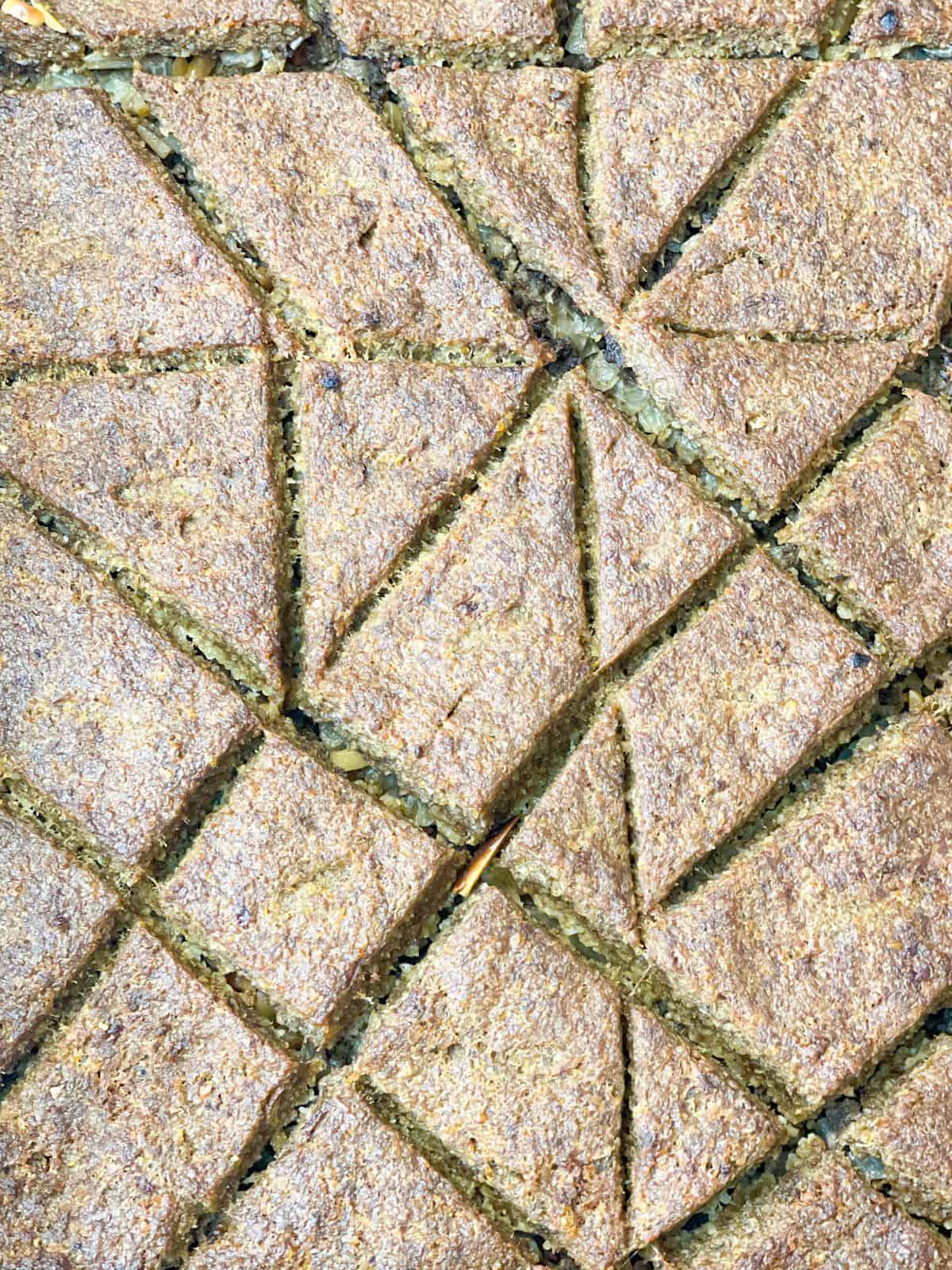 beautiful pan of kibbeh shaped into diamond forms and baked to perfection in the oven 