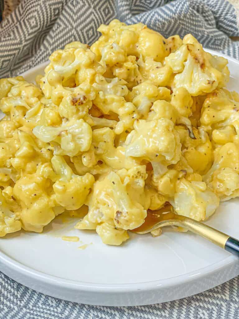 Roasted golden cauliflower florets folded into a cheesy cream sauce that satisfies your macaroni and cheese craving without all the guilt!
