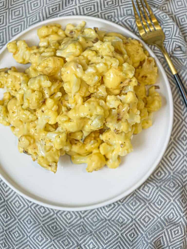 Roasted golden cauliflower florets folded into a cheesy cream sauce that satisfies your macaroni and cheese craving without all the guilt!