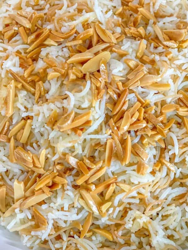 fluffy white vermicelli rice topped with toasted almond slivers