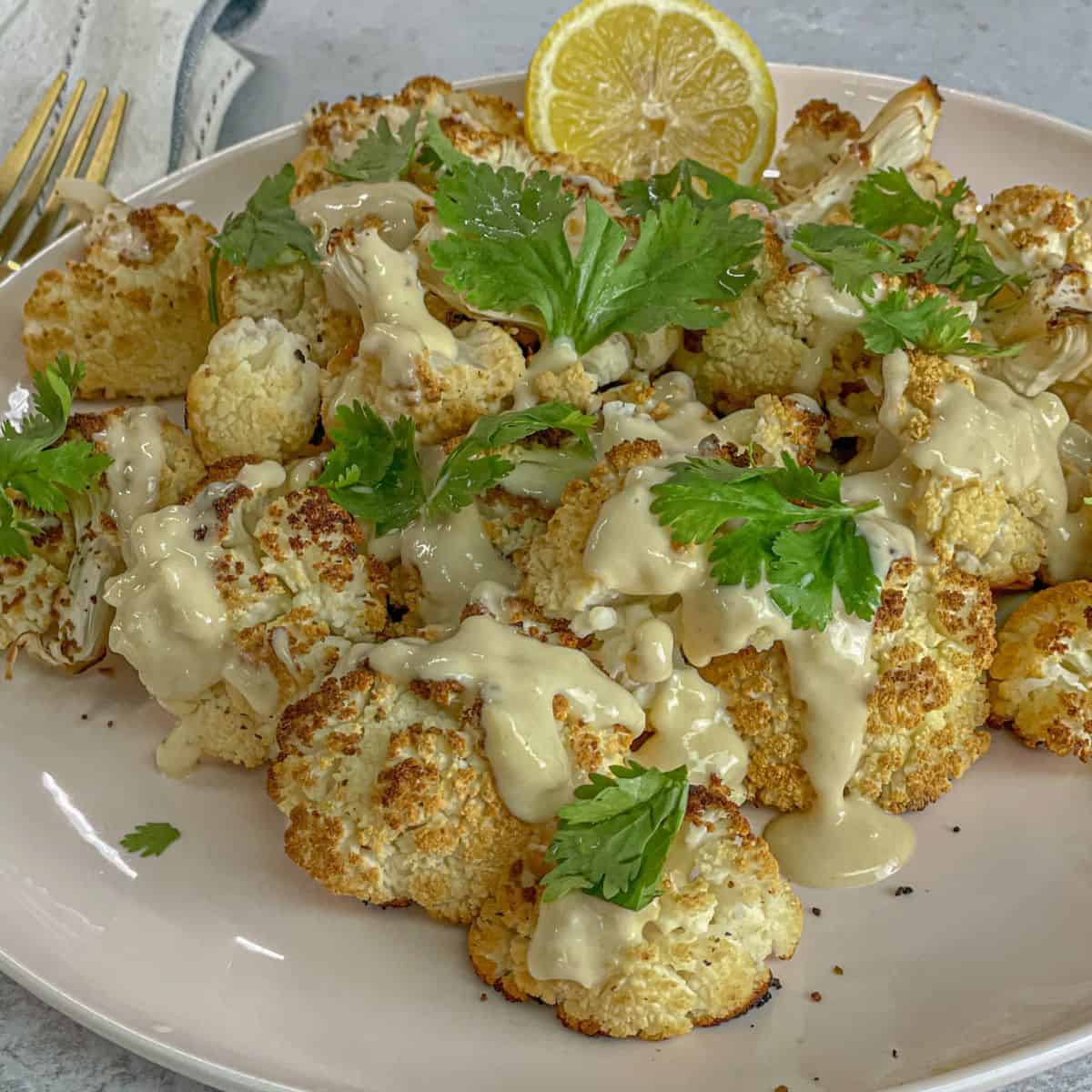TasteGreatFoodie - Spicy Roasted Cauliflower with Tahini Dressing - Vegan