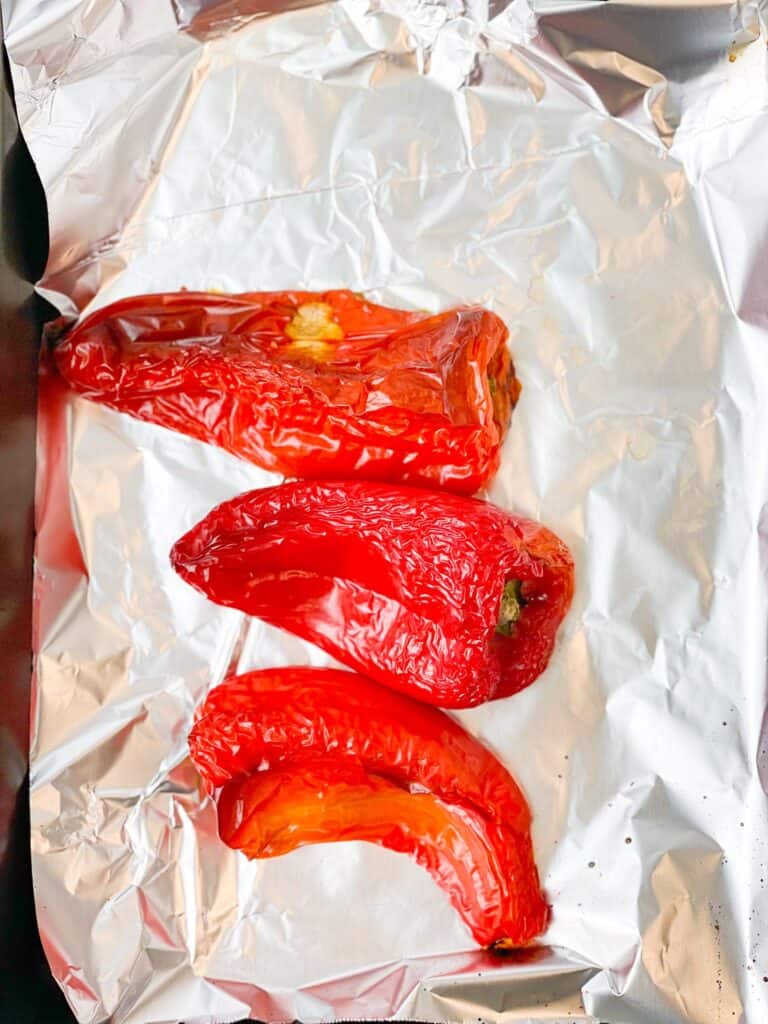 the first step to make muhammara side dish is to roast your red pepper 
