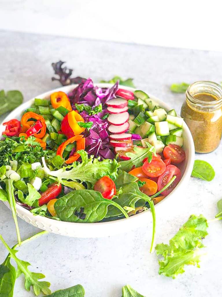 A bowl of tasty vegetables is great with a tangy dressing to make you fall in love with salad.