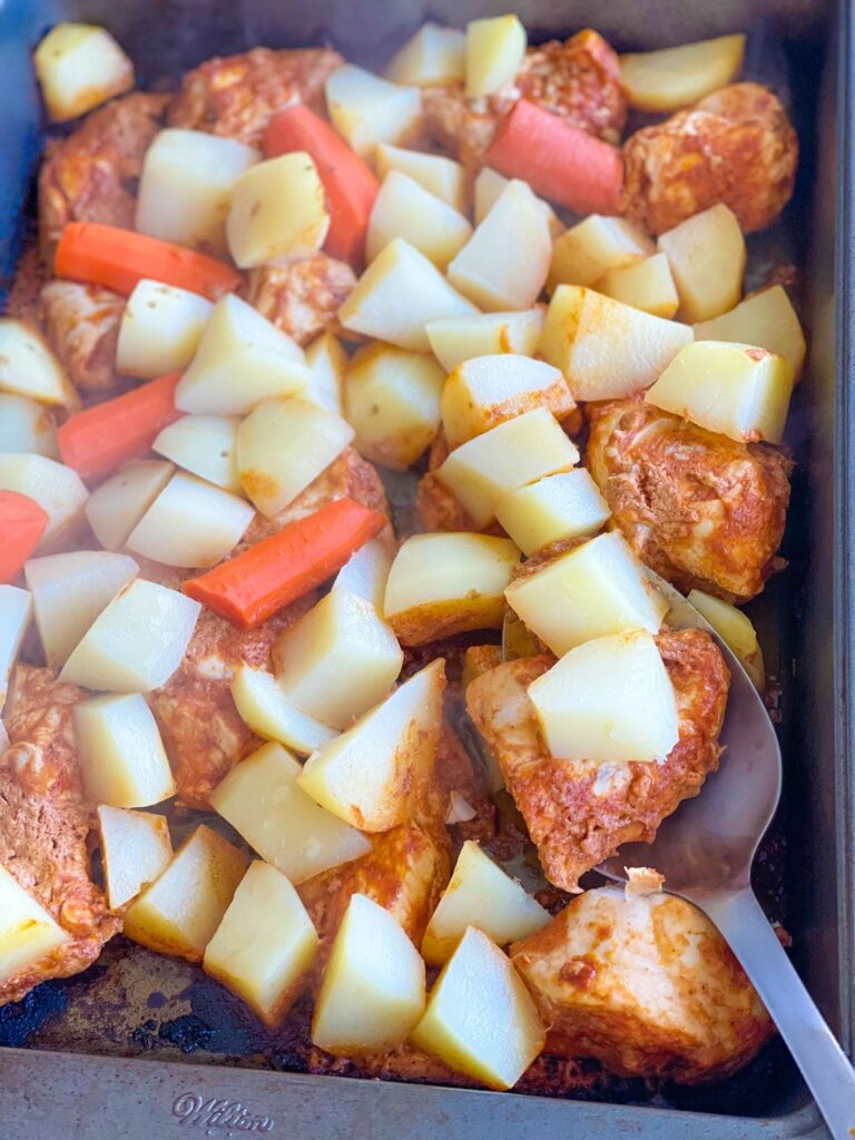 flavorful, succulent, tender chicken breasts and cubed potatoes and carrots marinated in a garlicky lemony tomato sauce with a touch of cumin and paprika.  