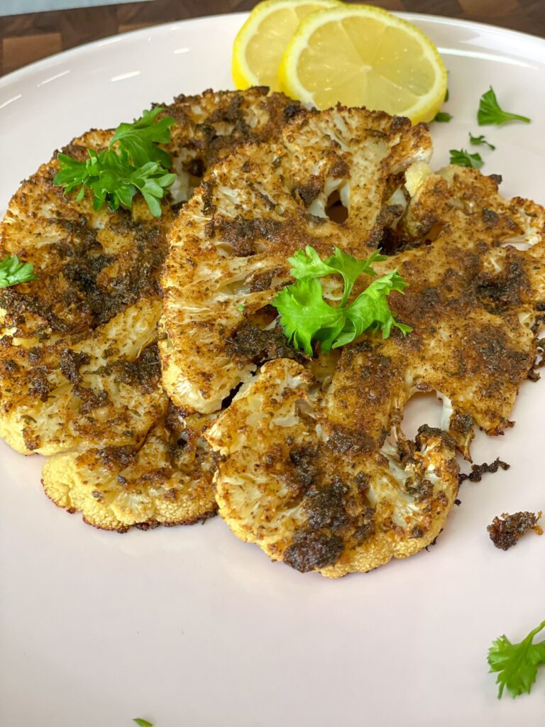 This Smoked Cauliflower Steaks Recipe introduces a steak-like cauliflower slices brushed with seasoned olive oil and toasted to golden perfection! 
