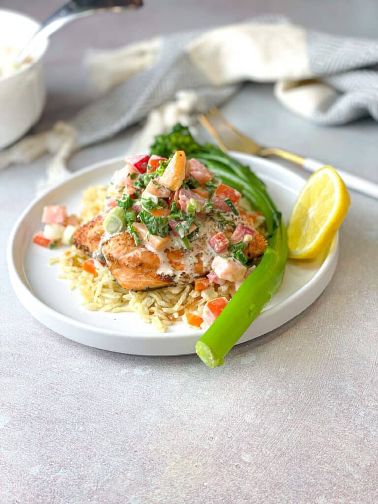 Salmon baked in oven is perfect with rice and tahini salsa. Enjoy!