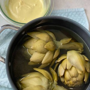 Boiled artichokes served with a divine combination of honey and mustard.