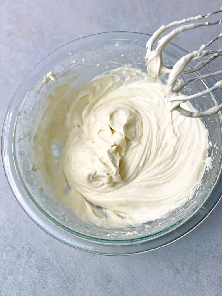 Whipped cream cheese frosting is perfect over cupcakes for friends gathering.