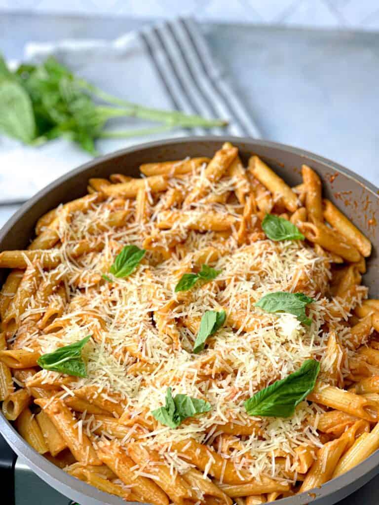 Gigi hadid viral pasta that was popular on tik tok with a creamy tomato sauce and parmesan cheese sprinkled with fresh basil