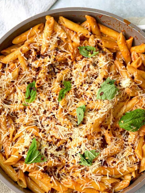 Gigi Hadid's Viral Pasta Recipe (without the vodka) garnished with fresh parmesan and basil leaves