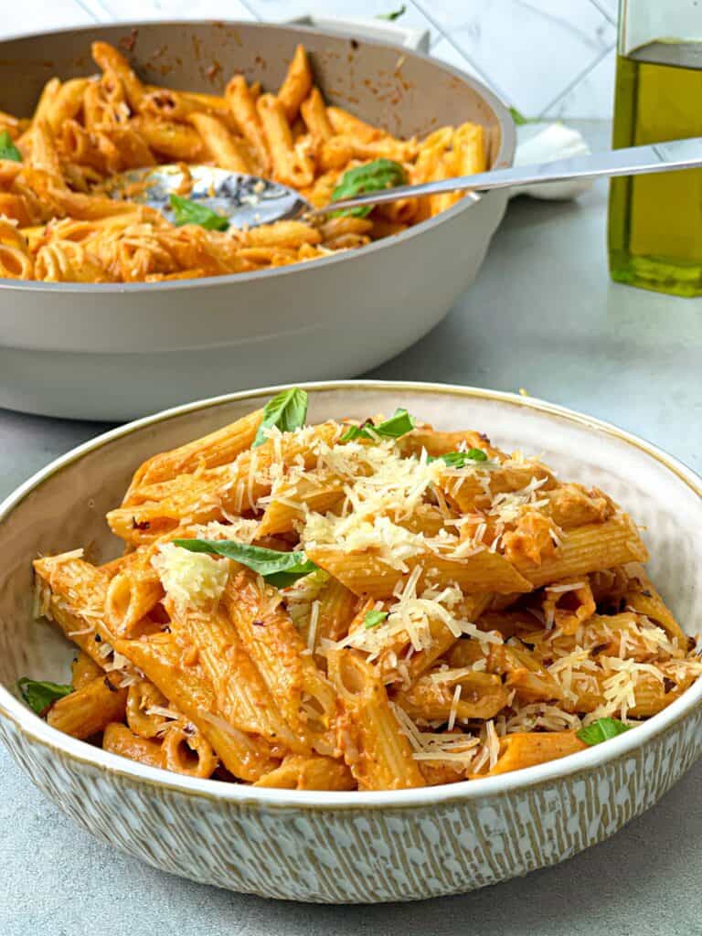 add some extra parmesan and basil to your bowl of Gigi Hadid's Viral Alla Vodka Pasta