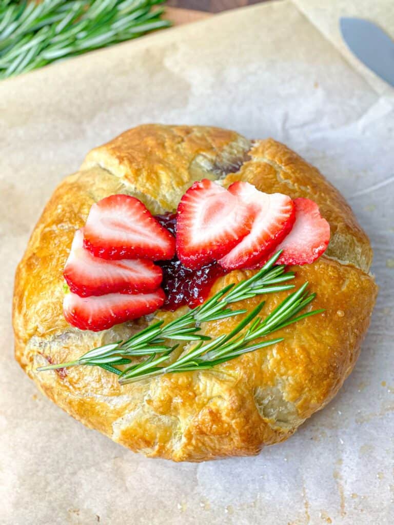 This strawberry jam baked brie in puff pastry introduces baked cheese topped with strawberry jam and wrapped in puff pastry