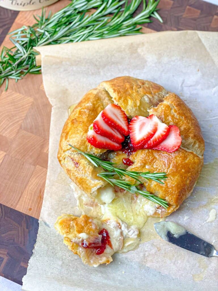 This strawberry jam baked brie in puff pastry introduces baked cheese topped with strawberry jam and wrapped in puff pastry