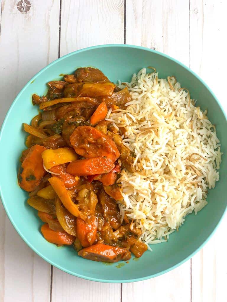A dish of chicken gallaba with a bed of rice is a savory dish that satisfies your tummy after a long busy day