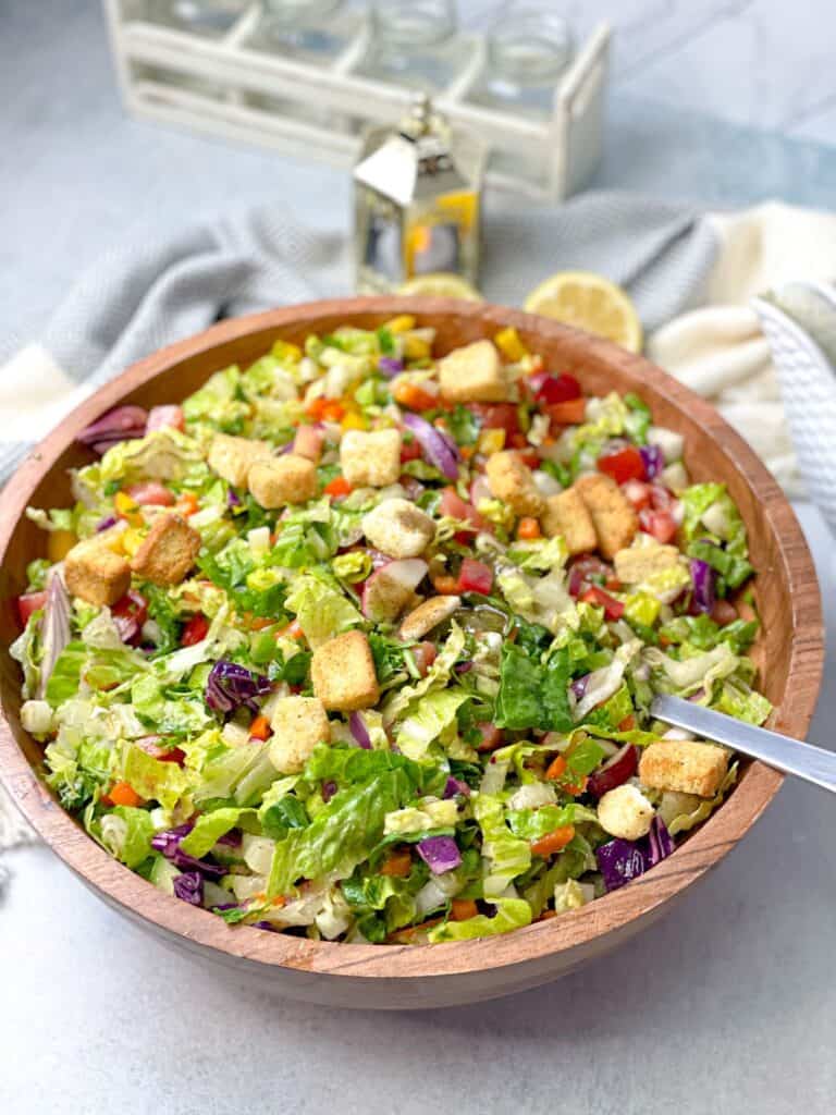 A bowl of chopped tomatoes, cucumber, and other veggies that you like with this special savory dressing is what you need to satisfy your cravings.