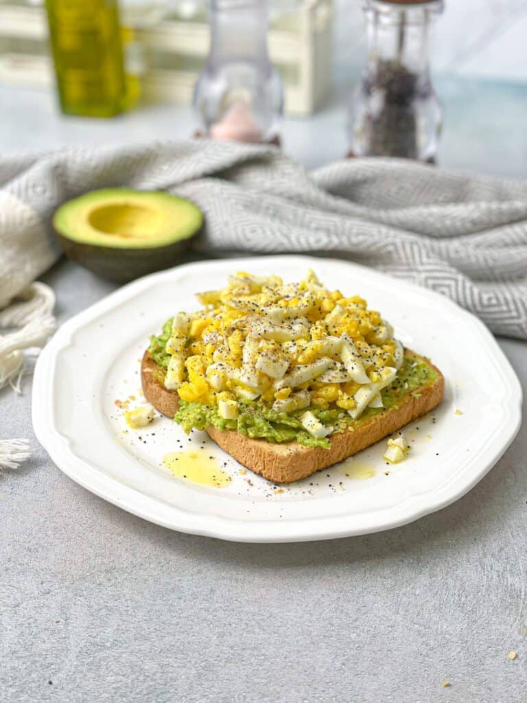 Viral Tiktok Grated egg toast recipe that is trending all over the internet made with three simple ingredients: toast, eggs, and avocado!