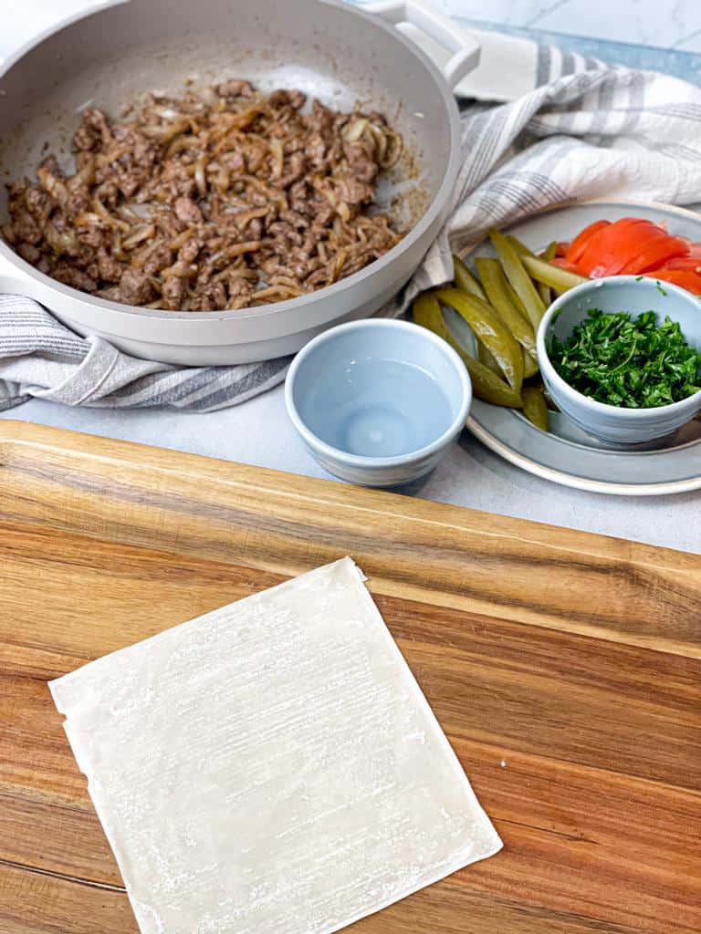 Set the spring roll wrapper flat on a clean surface.