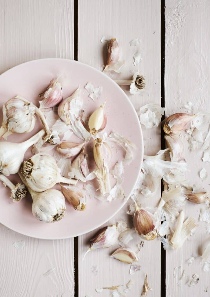 unpeeled garlic bulbs and cloves