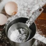 two measuring cups that had been used to measure dry ingredients