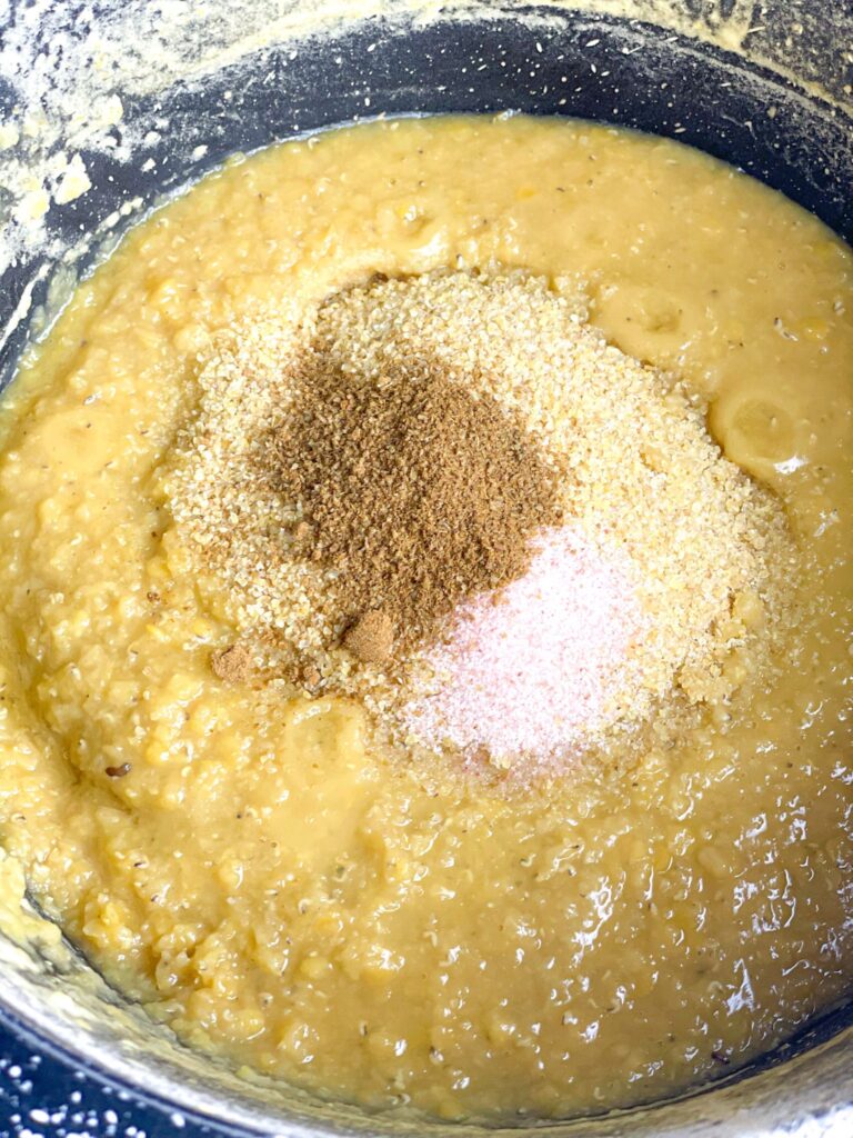 bulgur, cumin, and salt are added to the cooked red lentils
