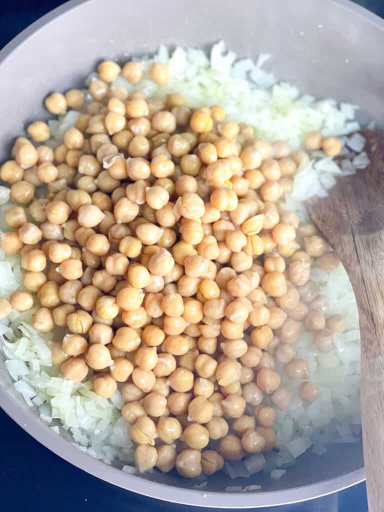 onion cubes and chickpeas sautéed in olive oil