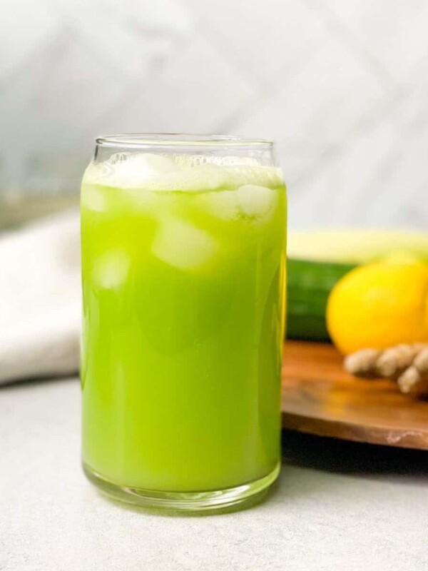 Cucumber Celery Detox Juice made with a mix of celery, cucumber, lemon, and ginger and ice cubes