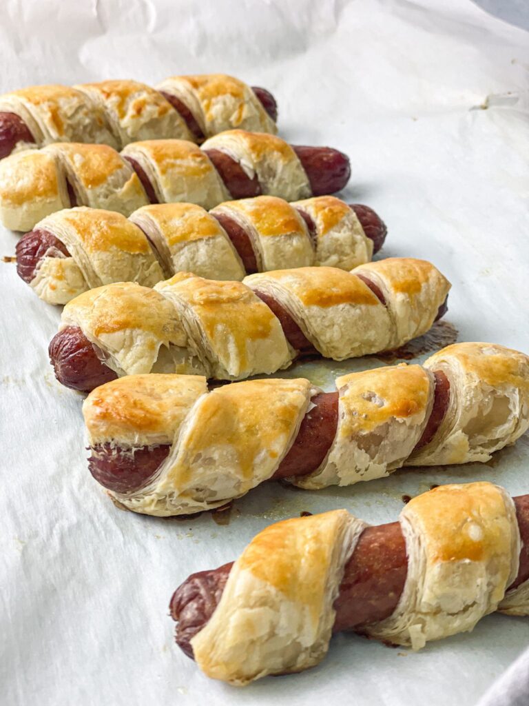 Baked hot dogs wrapped in puff pastry