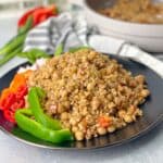 Vegetarian Bulgar and Tomato Pilaf with chickpeas served with fresh veggies
