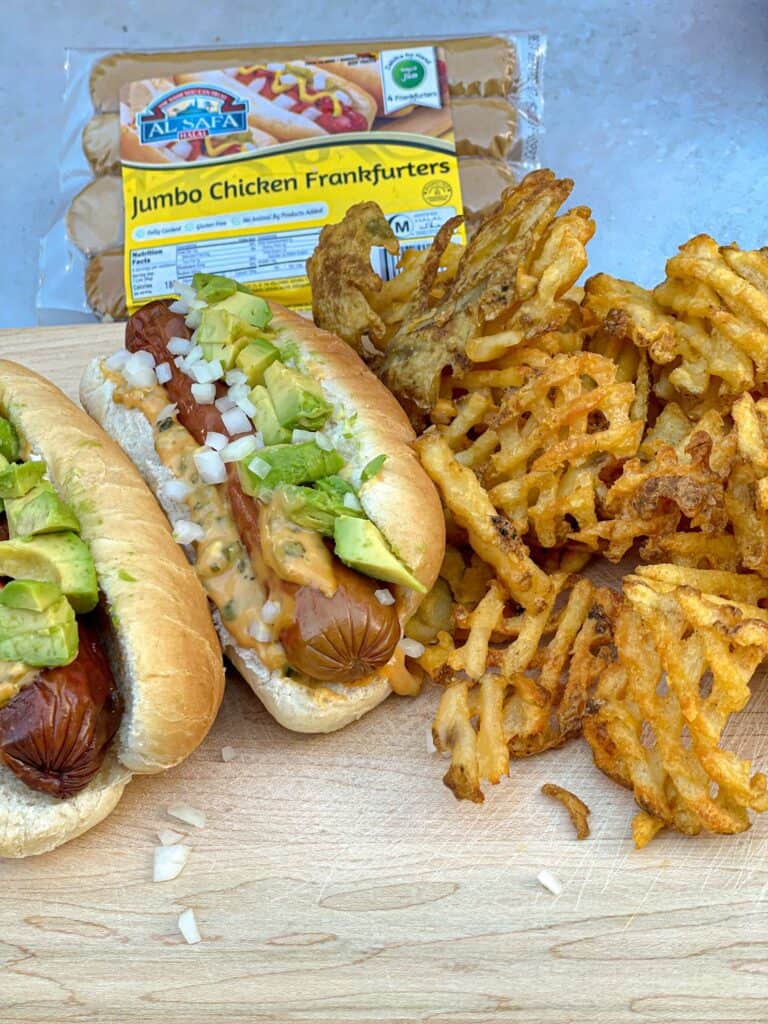 Frankfurter sandwiches with sauce and fried chips