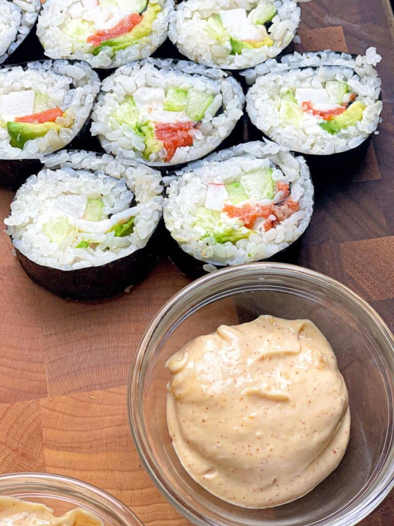 Sushi rolls served with a delicious mayo sauce
