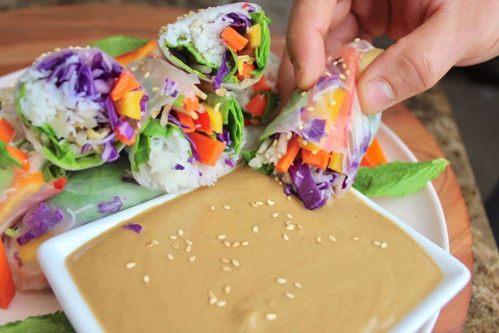 Scrumptious Vietnamese Rolls filled with colourful fresh vegetables served with dipping sauce