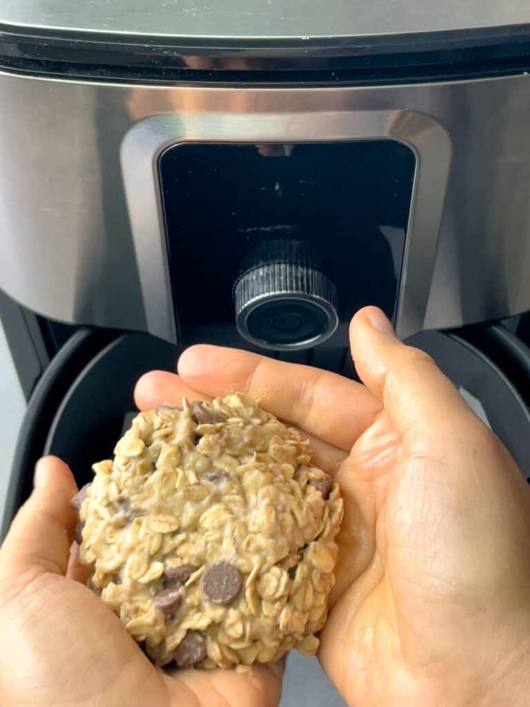 shaping the cookie with wet hands