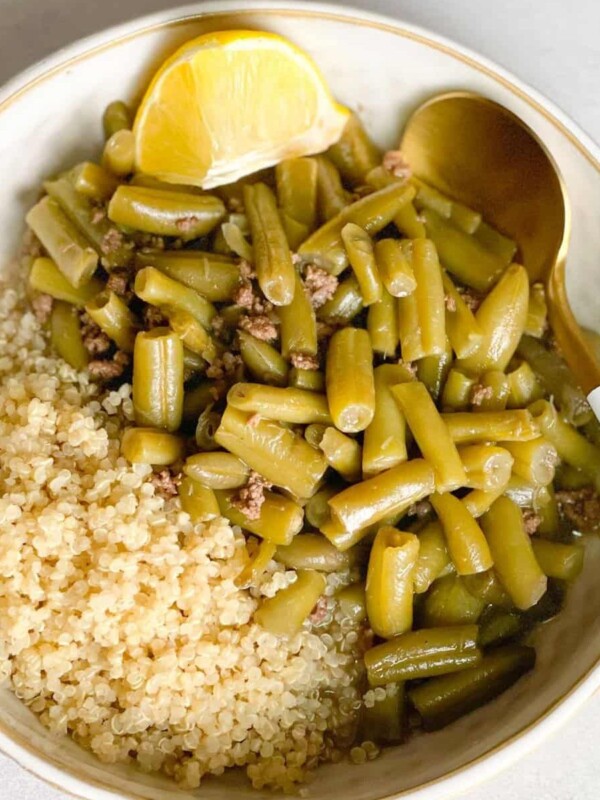 Green bean stew with minced beef served with fluffy quinoa.