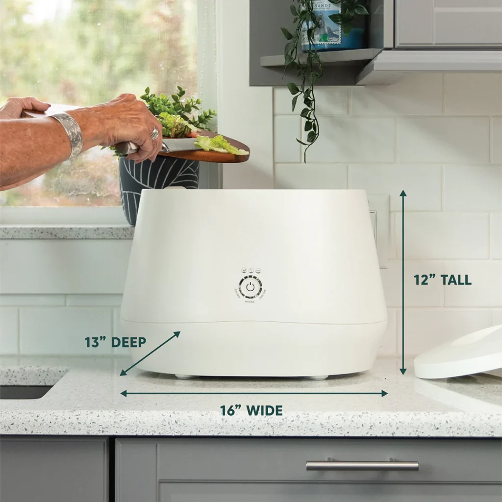 The Lomi composter by Pela is counter friendly and measures 16 inches wide by 12 inches high