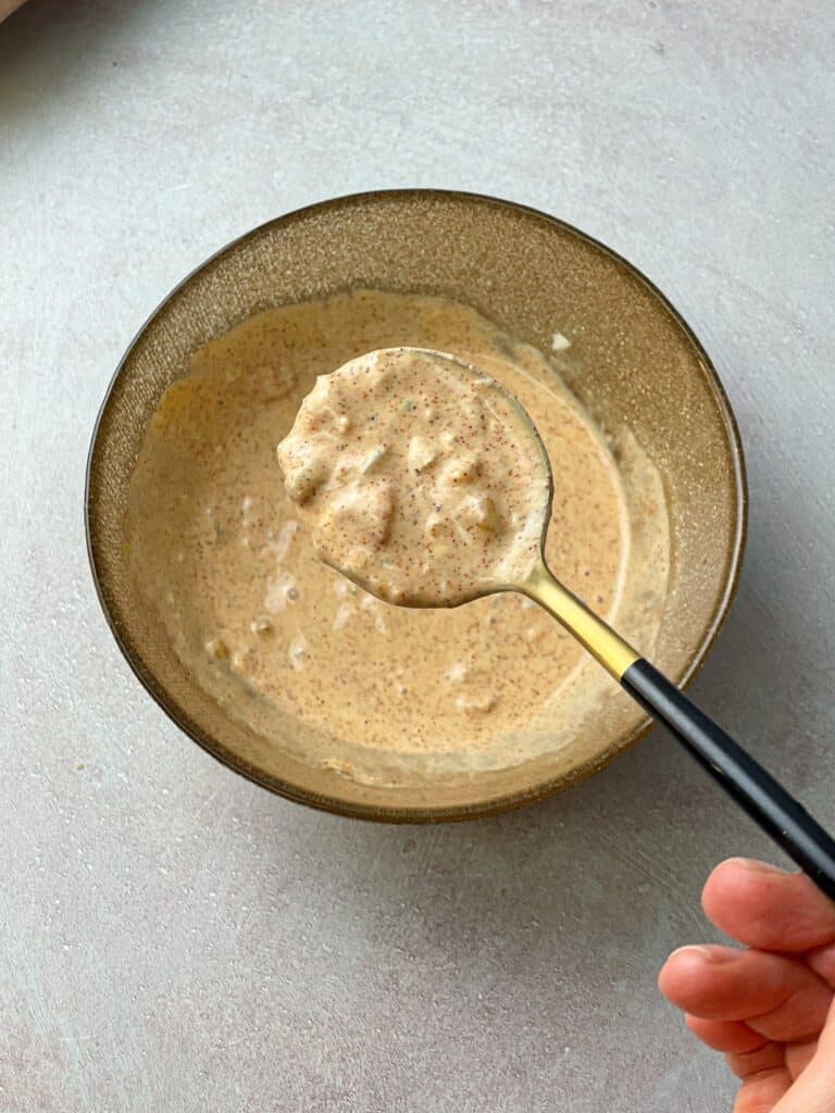 A bowl of creamy remoulade sauce for your chicken sub sandwich