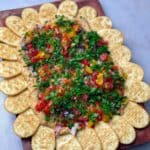 Hummus Dip and Crackers Topped with Veggies