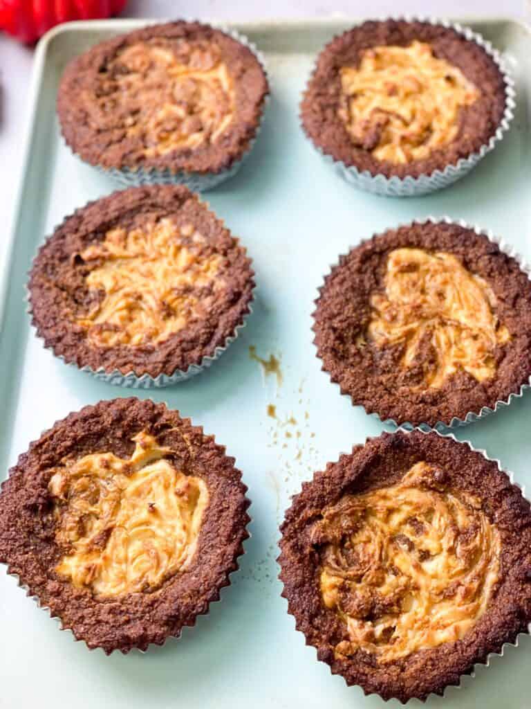 Gluten-free pumpkin muffins with a cheese swirl on top