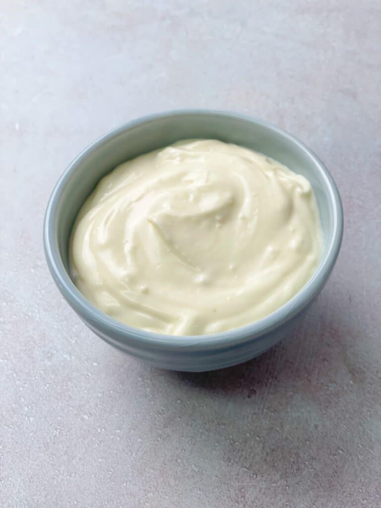 A small bowl of garlic aioli with mayo, garlic, olive oil, lemon, and a pinch of salt will do wonders to your sandwiches