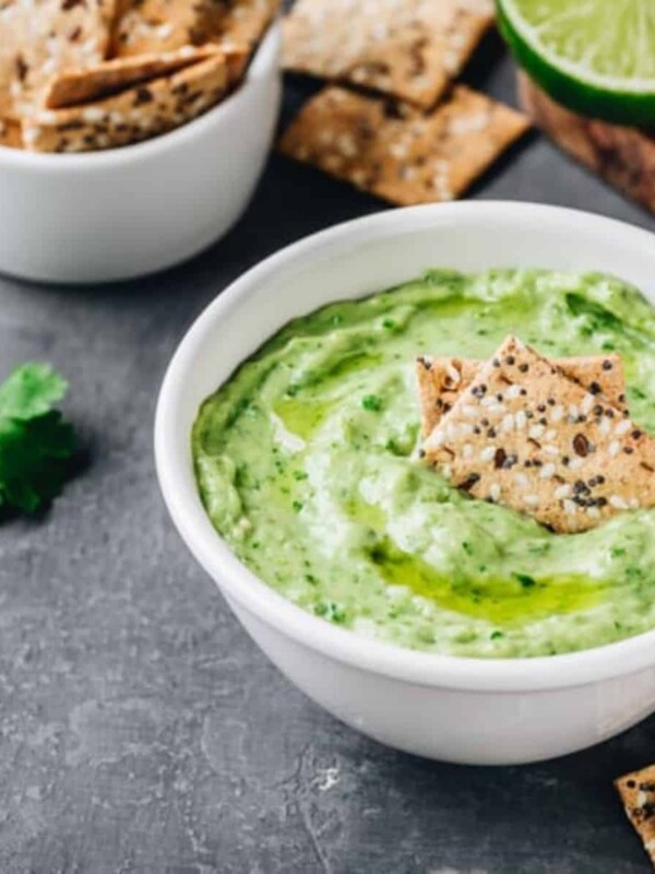 creamy avocado dip with cilantro and lime and drizzled with olive oil