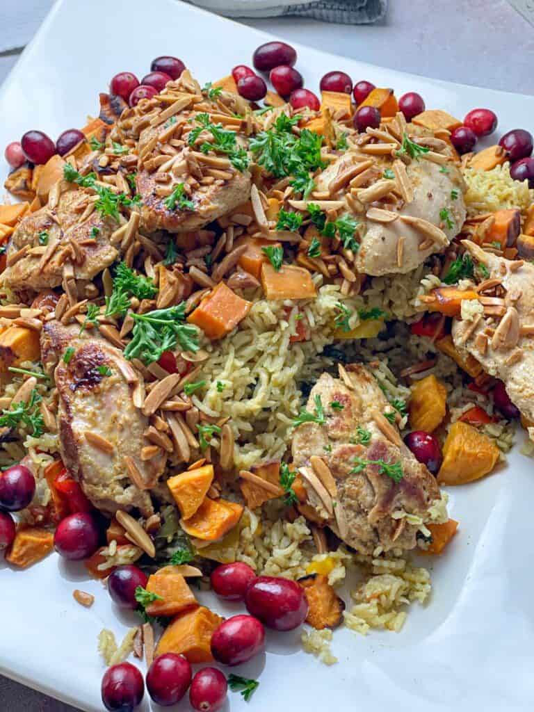 a comforting, one pan chicken and rice dish with layers of flavorful Middle Eastern spices