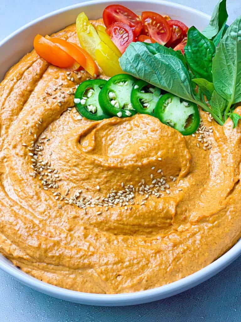 Creamy, smoky, flavorful spicy roasted red pepper hummus make the perfect dip.