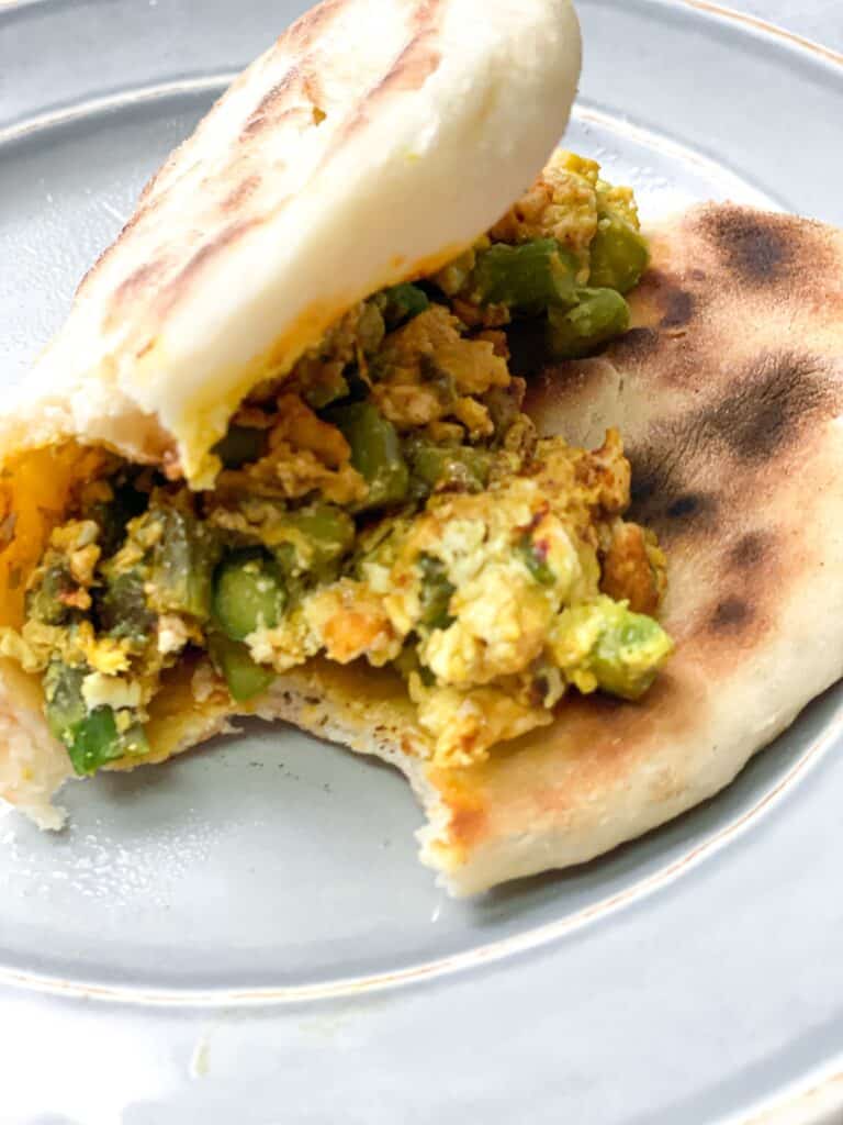 asparagus and eggs wrapped in a flat bread