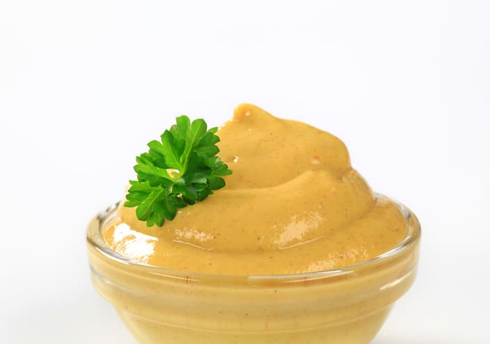 a bowl of chipotle aioli dipping sauce in a small glass bowl