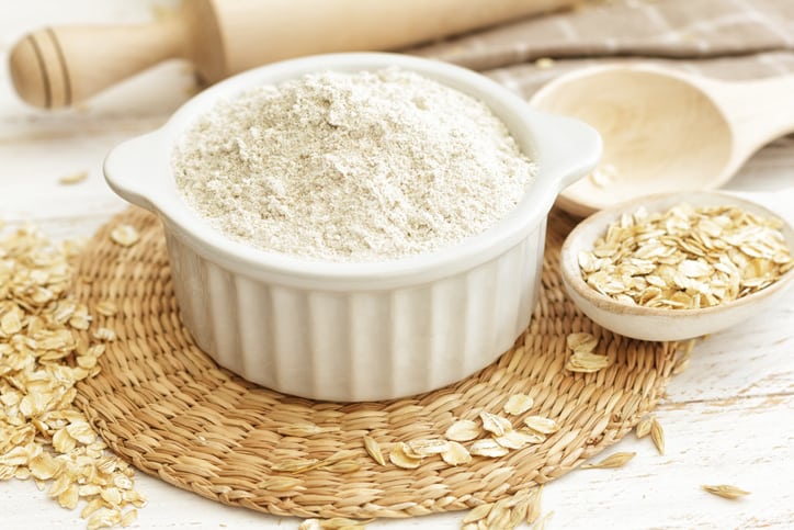 a glass bowl filled homemade oat flour