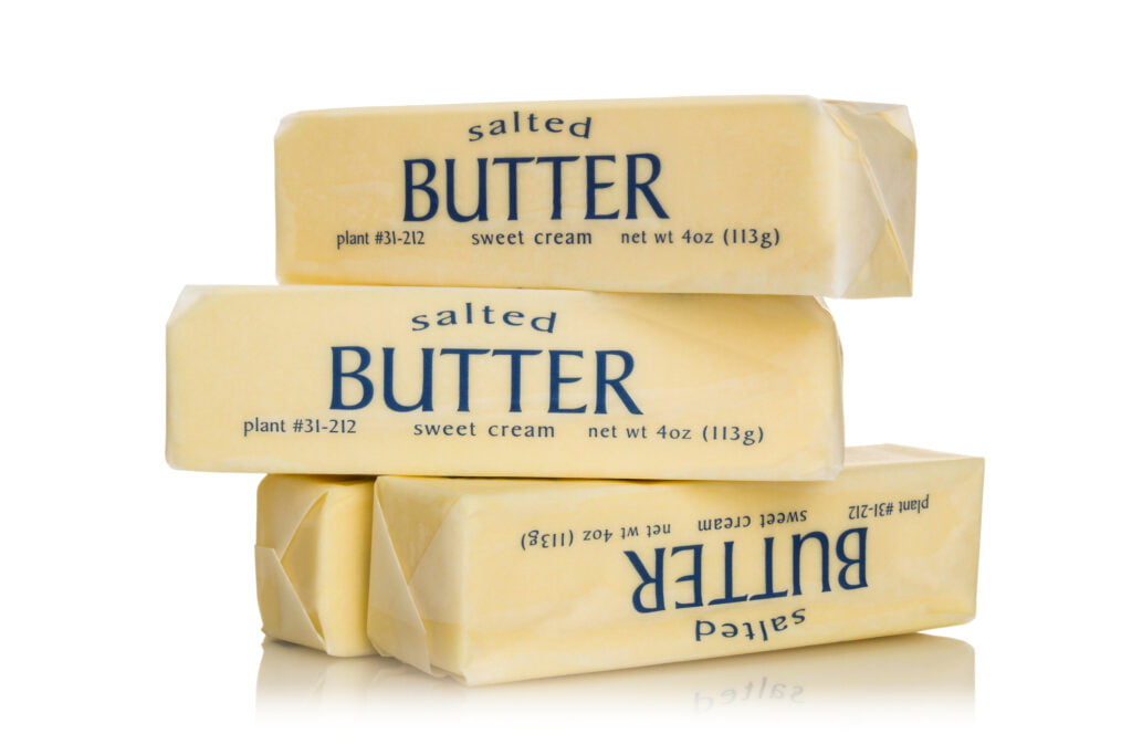 Four sticks of salted butter on top of each other.